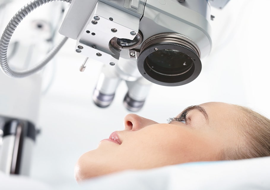 A young woman about to have a laser eye surgery operation