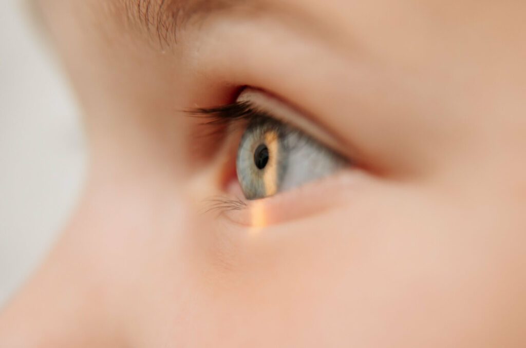 a close-up of a person undergoing an eye exam.